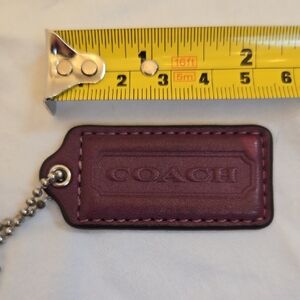 Coach Dark Purple Leather Tag Keychain